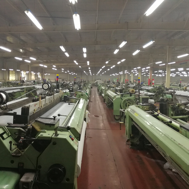 生产大棚防虫网用那种设备好